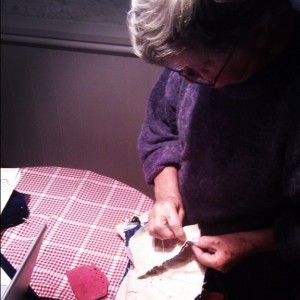 Super-Granny doing some embroidery (Copyright Corrie B)