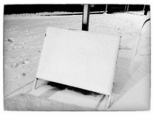 A very pretty snow-covered sign. (Copyright John S)