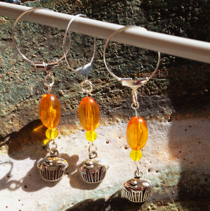 Orange stitch markers made from Grace beads. Orange stitch markers made from Grace beads.