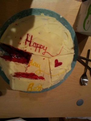 A cake, expertly cut by JS.