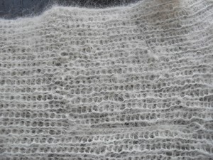 A row of messed-up-ness in a picked up stitch.