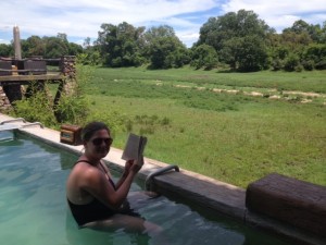 Reading in the pool. Reading in the pool.