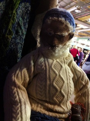 A gruff old fisherman wearing an aran sweater.