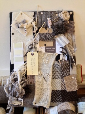 Gorgeous mood-board with woven and knitted samples, and a needle-felted dog.