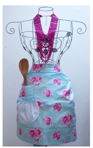 Apron on a gorgeous rose mannequin.