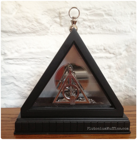 The Deathly Hallows necklace.