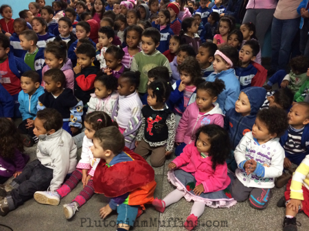 Kids captivated by the dancing doll.