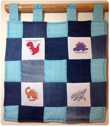 A dinosaur wall-hanging; original designs copyright Coranda Berry 2015.