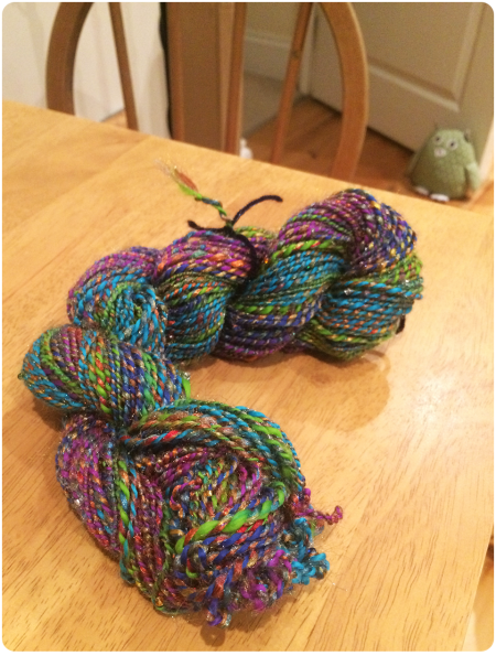 The first rainbow skein comprising of violet to green.