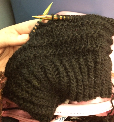 Halfway through the hat and knitting on the bus.
