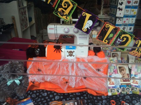 A Halloween display in the window.