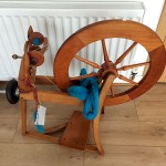 My spinning wheel and my roving ready to go.