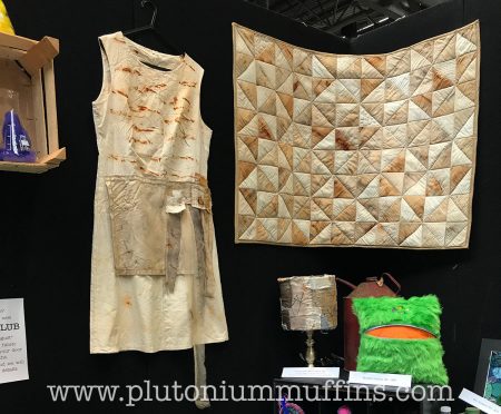 A quilt and apron from Inventor's Asylum, dyed with iron nails.