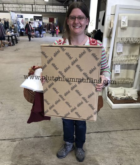 With my new spinning wheel!!! My biggest purchase at a wool show in years. With my new spinning wheel!!!