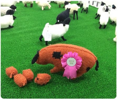 A sow and her piglets, second place in the Knitted Farm competition.