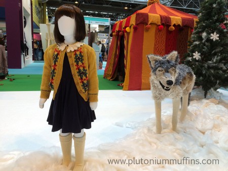 Lucy and a wolf. I love the cardigan - really wanted to get a pattern for it but couldn't find them to talk to!