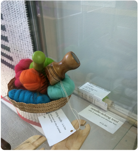 Needle felting tools - with a fossilised dinosaur bone embedded in the handle of the needle holder.