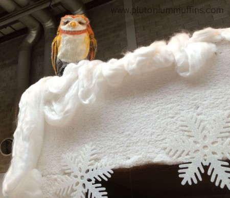 A cheeky little felted owl on top of the wardrobe.