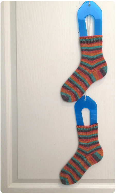 The Angel Socks - blocking on the door because Tonks finds them irresistible to play with.