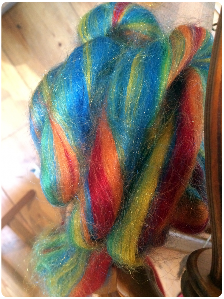 Rainbow fibre waiting to be spun.