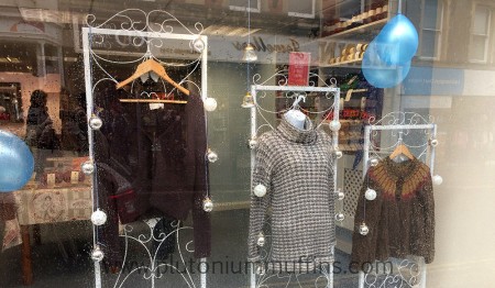 Knitted samples in the window of the Bluestocking Wool Shop. Close-up of samples in the window of the shop.