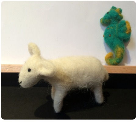 A needle-felted sheep and a little seahorse called Champion.