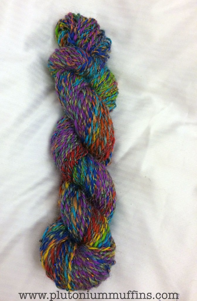 A completed skein of rainbow yarn, ready to be knitted into something nice.