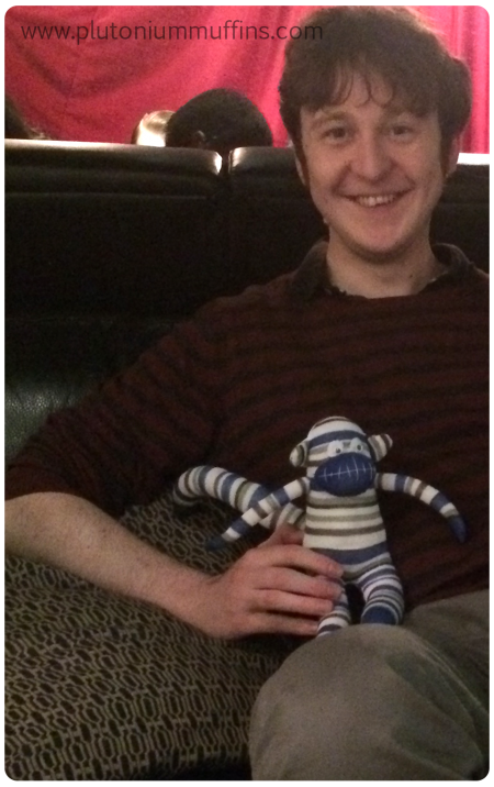 Our buddy with his new sock monkey.