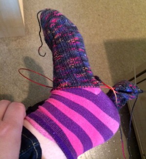 And the socks now, about double the length on the foot and an inch from the heel turn.