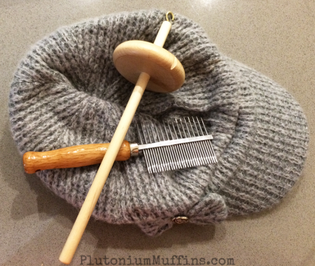 My purchases for the weekend - new drop-spindle, a comb and a new hat!