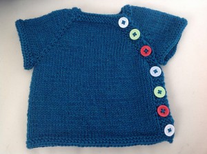 Tabby15 finished this lovely baby cardigan.