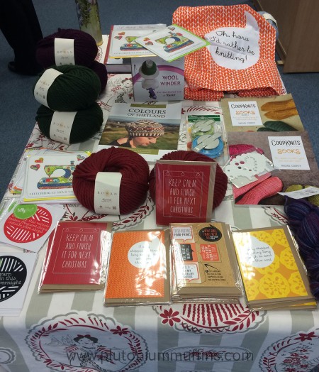 Table display as you enter the Bluestocking Wool Shop. The table in the centre of the shop with some of the beautiful extras on display.