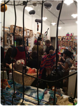 The whole group through decorative bars on the Wild and Woolly window (photo copyright Summer Mughrabi)